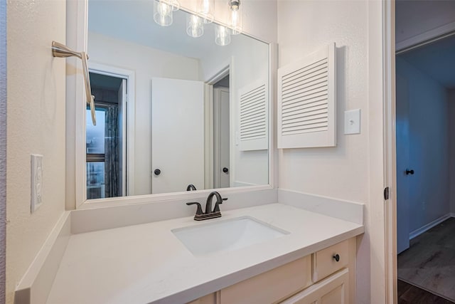 19718 Franz Rd, Houston, TX 77084 - bathroom featuring vanity and wood finished floors