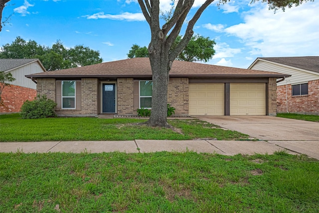 19718 Franz Rd, Houston, TX 77084 - single story home with a garage, concrete driveway, brick siding, a front yard, and a shingled roof