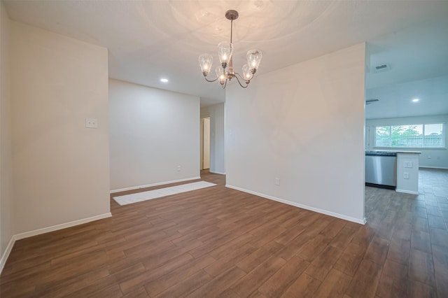 19718 Franz Rd, Houston, TX 77084 - spare room with dark wood finished floors, a chandelier, and recessed lighting