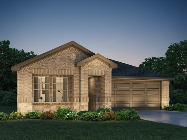 12038 Rushing Ridge Dr, Baytown, TX 77523 - view of front of home featuring brick siding, concrete driveway, an attached garage, and stone siding