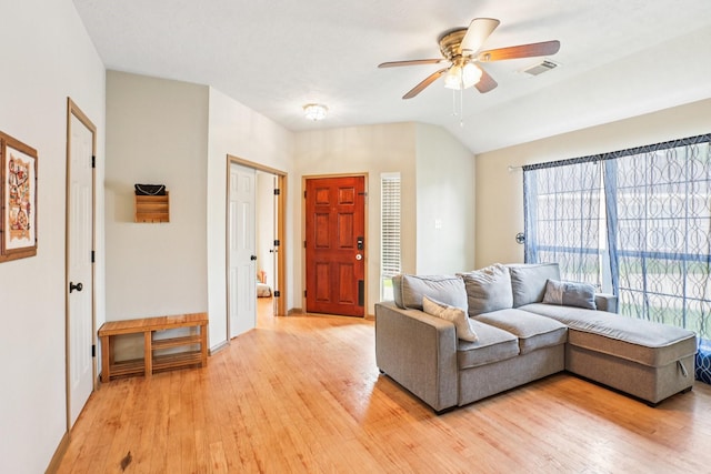 3211 Waterglen Ct, League City, TX 77573 - living room featuring a ceiling fan, light wood-style flooring, and plenty of natural light