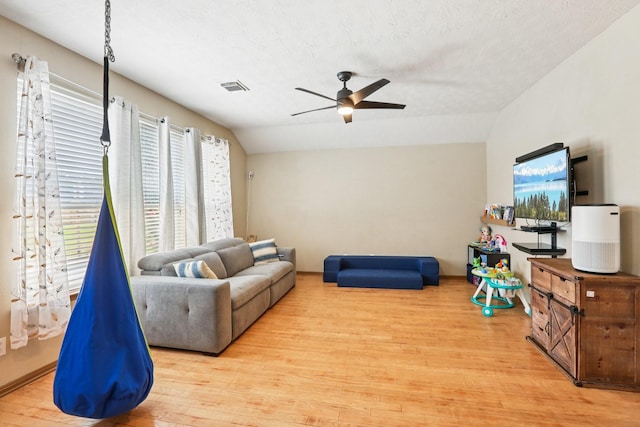 3211 Waterglen Ct, League City, TX 77573 - living room featuring lofted ceiling, wood finished floors, and ceiling fan