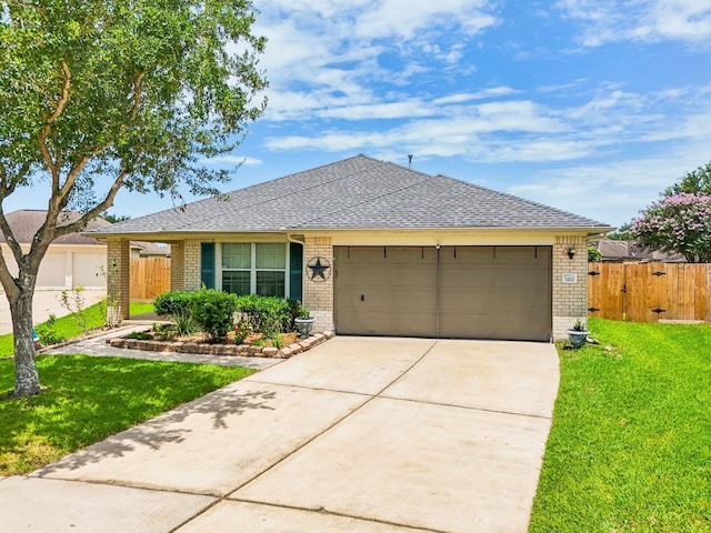 3211 Waterglen Ct, League City, TX 77573 - single story home featuring brick siding, a garage, driveway, and a shingled roof