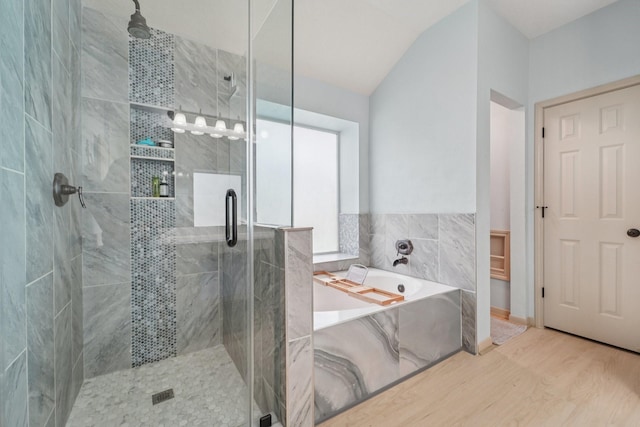 3211 Waterglen Ct, League City, TX 77573 - full bathroom featuring a garden tub, a stall shower, wood finished floors, and lofted ceiling