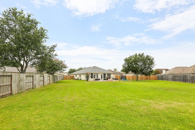 3211 Waterglen Ct, League City, TX 77573 - fenced backyard with a patio area
