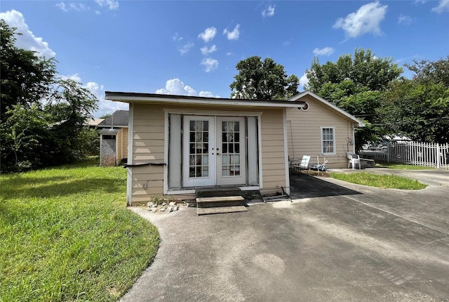 1107 Wooding St, Houston, TX 77011 - view of outbuilding featuring french doors