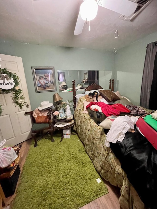 1107 Wooding St, Houston, TX 77011 - bedroom with wood finished floors and ceiling fan