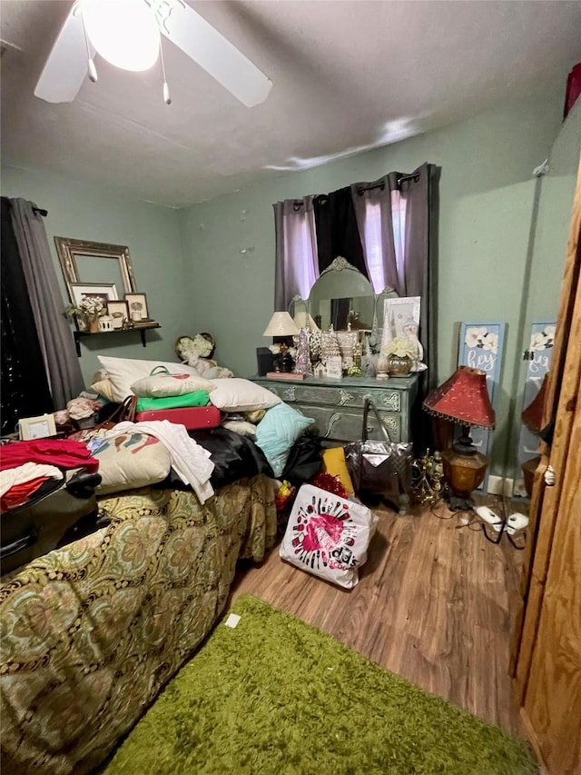 1107 Wooding St, Houston, TX 77011 - bedroom featuring wood finished floors and ceiling fan