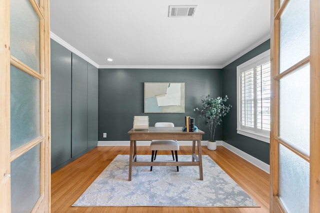 2119 Latexo Dr, Houston, TX 77018 - home office featuring crown molding, light wood finished floors, and recessed lighting