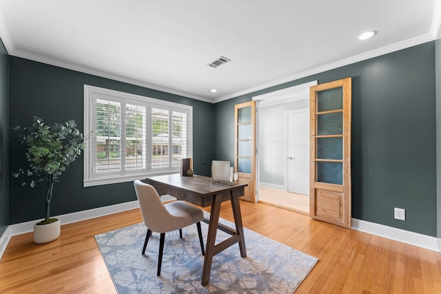 2119 Latexo Dr, Houston, TX 77018 - office with light wood finished floors, ornamental molding, and recessed lighting