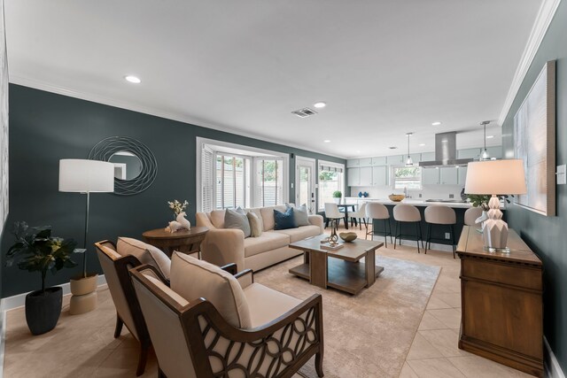 2119 Latexo Dr, Houston, TX 77018 - living area with light tile patterned floors, recessed lighting, plenty of natural light, and ornamental molding