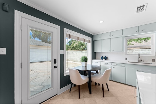 2119 Latexo Dr, Houston, TX 77018 - dining area with ornamental molding, plenty of natural light, light tile patterned floors, and recessed lighting