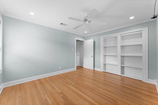 2119 Latexo Dr, Houston, TX 77018 - unfurnished bedroom featuring light wood-style flooring, recessed lighting, ornamental molding, ceiling fan, and a closet