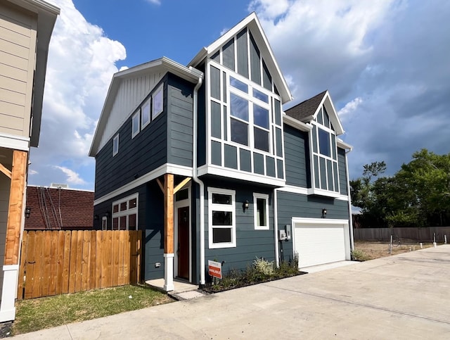 9311 Montridge Dr, Houston, TX 77080 - view of front facade featuring a garage and driveway