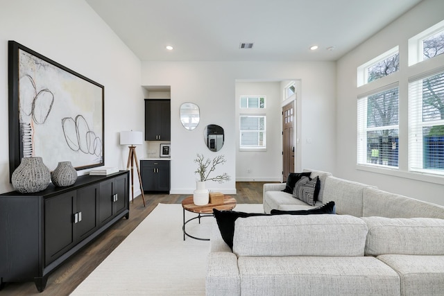 9311 Montridge Dr, Houston, TX 77080 - living room featuring dark wood-type flooring and recessed lighting