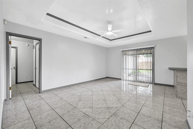 619 Rocky Mountain Dr, Houston, TX 77037 - spare room featuring a tray ceiling and ceiling fan