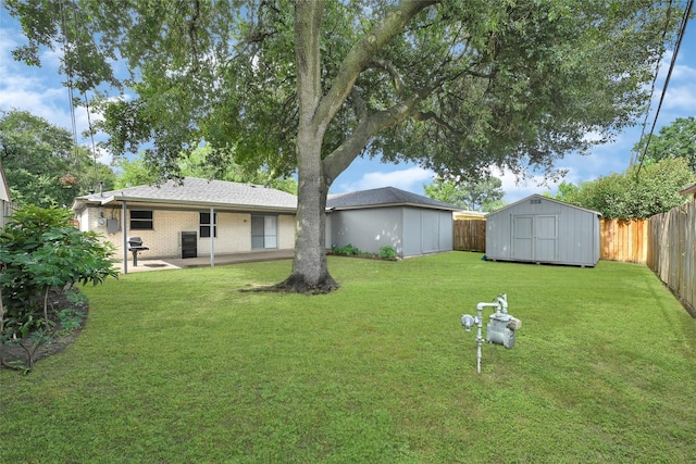 619 Rocky Mountain Dr, Houston, TX 77037 - fenced backyard with a storage shed and a patio area