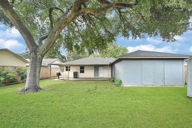 619 Rocky Mountain Dr, Houston, TX 77037 - back of house featuring a patio and roof with shingles