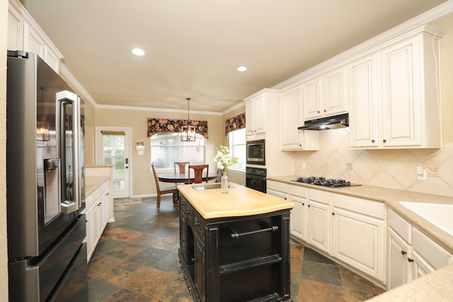 14310 Saint Pierre Ln, Cypress, TX 77429 - kitchen with black appliances, stone tile flooring, light countertops, under cabinet range hood, and recessed lighting