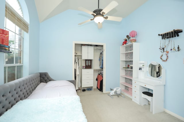 14310 Saint Pierre Ln, Cypress, TX 77429 - bedroom featuring light carpet, a closet, lofted ceiling, and a ceiling fan