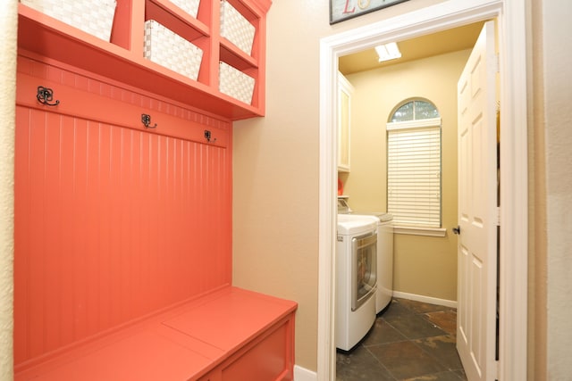 14310 Saint Pierre Ln, Cypress, TX 77429 - washroom with washing machine and dryer and cabinet space