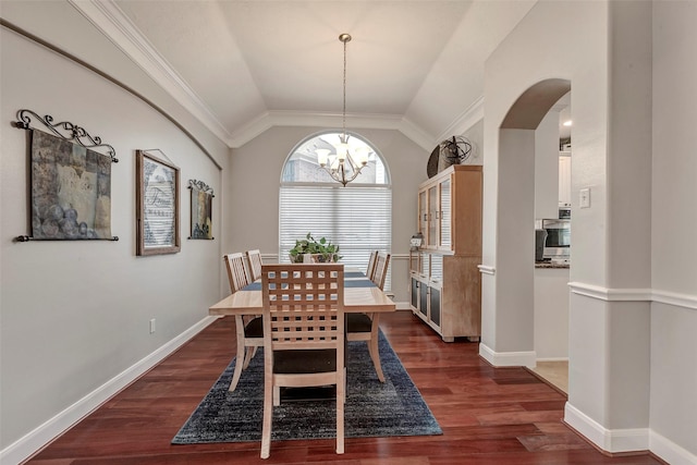 16407 Torry View Ter, Houston, TX 77095 - dining area with arched walkways, a chandelier, dark wood-type flooring, vaulted ceiling, and ornamental molding