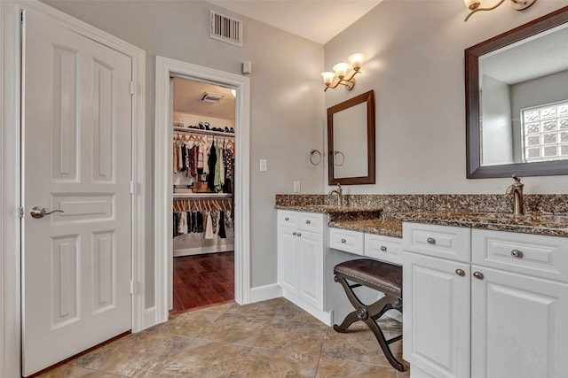 16407 Torry View Ter, Houston, TX 77095 - bathroom with double vanity and a walk in closet