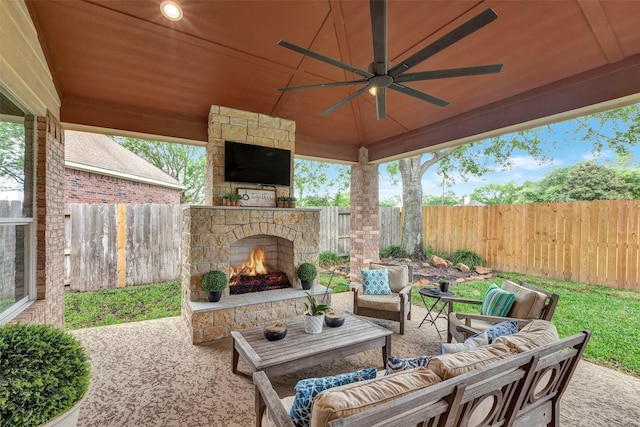 16407 Torry View Ter, Houston, TX 77095 - fenced backyard featuring a patio area, an outdoor living space with a fireplace, and ceiling fan