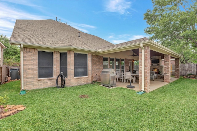 16407 Torry View Ter, Houston, TX 77095 - rear view of house with a shingled roof, a patio area, ceiling fan, and brick siding