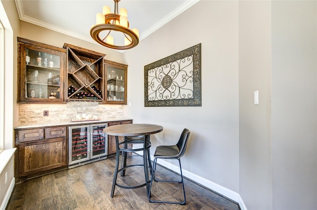 6506 Camillia Ct, Katy, TX 77493 - indoor dry bar with beverage cooler, backsplash, dark wood-style flooring, ornamental molding, and decorative light fixtures