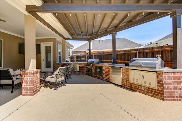 6506 Camillia Ct, Katy, TX 77493 - view of patio featuring an outdoor kitchen and outdoor dining area