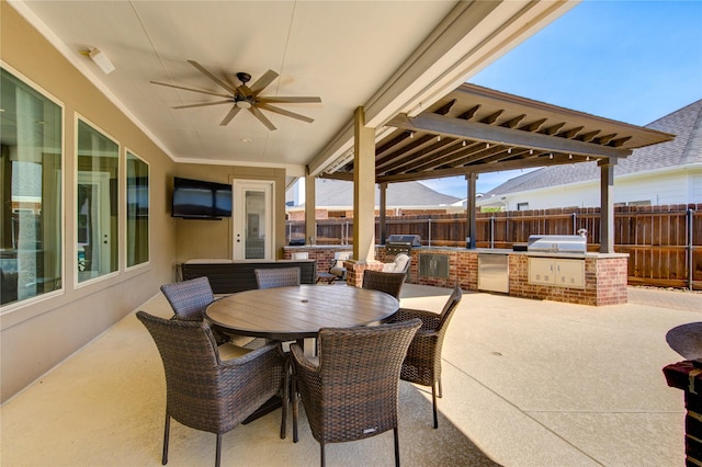 6506 Camillia Ct, Katy, TX 77493 - view of patio with exterior kitchen, ceiling fan, and outdoor dining area