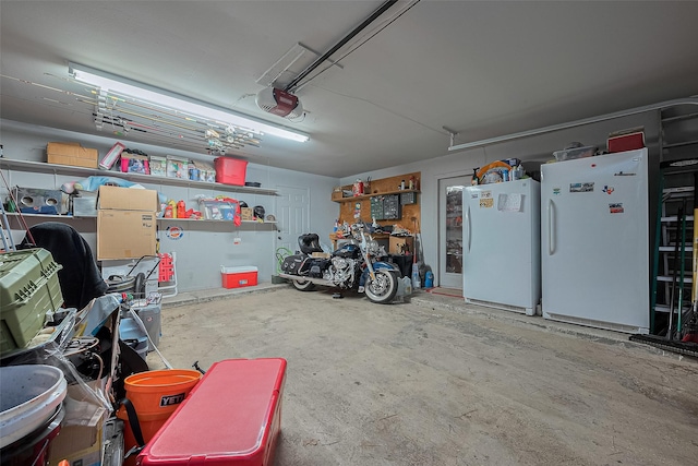 16318 Spinnaker Dr, Crosby, TX 77532 - garage featuring freestanding refrigerator and a garage door opener