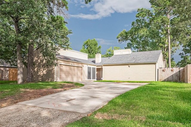 16318 Spinnaker Dr, Crosby, TX 77532 - mid-century home with concrete driveway, a chimney, and a garage