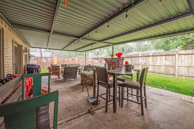 16318 Spinnaker Dr, Crosby, TX 77532 - fenced backyard featuring outdoor dining space and a patio area
