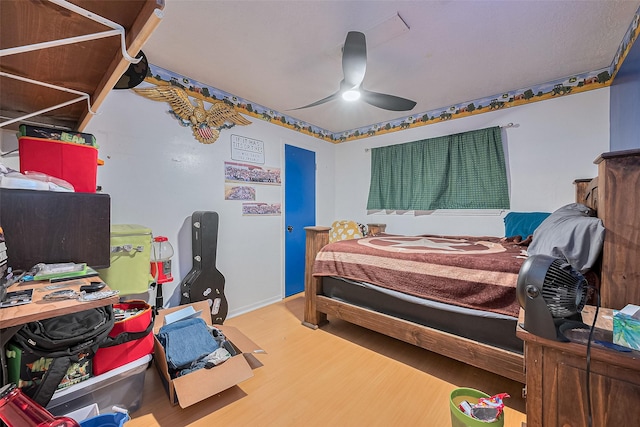 16318 Spinnaker Dr, Crosby, TX 77532 - bedroom featuring wood finished floors and ceiling fan