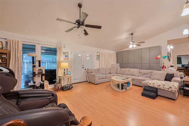 16318 Spinnaker Dr, Crosby, TX 77532 - living area featuring ceiling fan, wood finished floors, french doors, and high vaulted ceiling