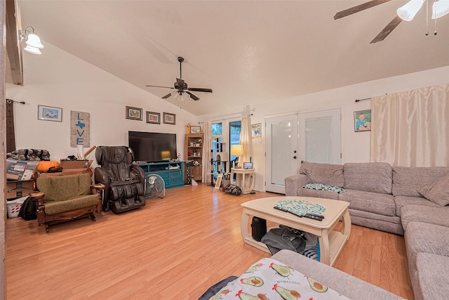 16318 Spinnaker Dr, Crosby, TX 77532 - living area featuring a ceiling fan, light wood-style flooring, high vaulted ceiling, and french doors