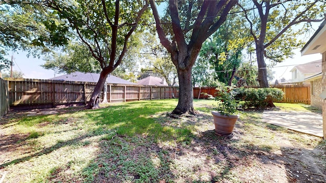 1116 N Bristol Ct, League City, TX 77573 - fenced backyard featuring a patio area