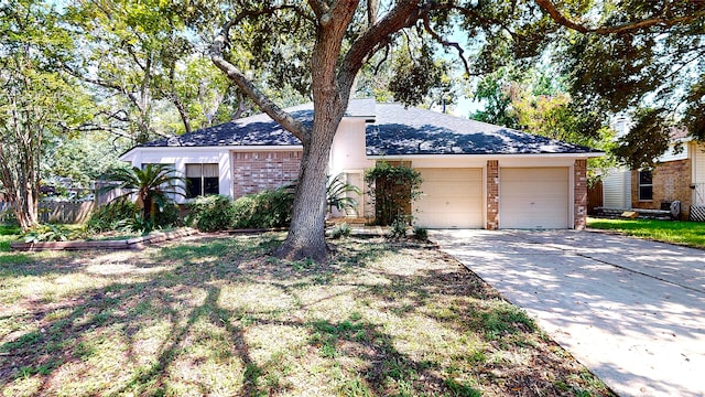 1116 N Bristol Ct, League City, TX 77573 - ranch-style home with brick siding, an attached garage, driveway, and roof with shingles