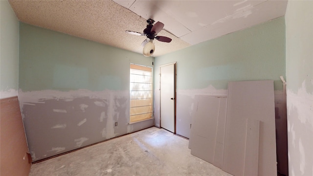 1116 N Bristol Ct, League City, TX 77573 - empty room with ceiling fan and unfinished concrete floors