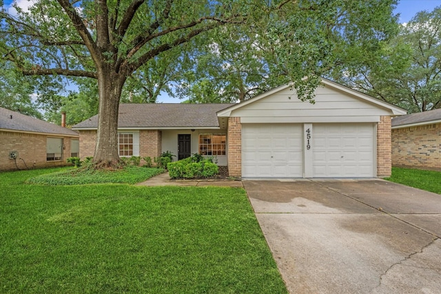 4519 Pineville Ln, Spring, TX 77388 - ranch-style house featuring brick siding, an attached garage, a front lawn, driveway, and a shingled roof