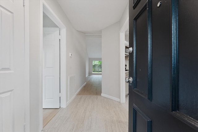 4519 Pineville Ln, Spring, TX 77388 - entryway with light wood-type flooring and baseboards