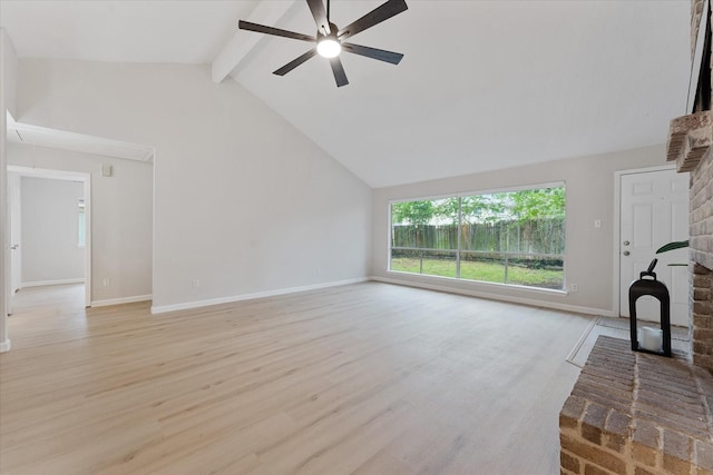 4519 Pineville Ln, Spring, TX 77388 - unfurnished living room with light wood-style flooring, a ceiling fan, and a fireplace