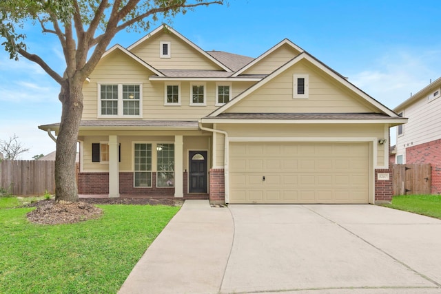 8207 Miramar Crest Ct, Tomball, TX 77375 - traditional-style home with brick siding, concrete driveway, a shingled roof, a garage, and a porch