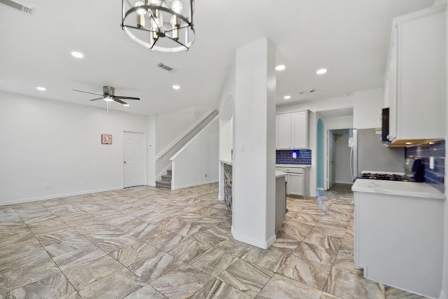 8207 Miramar Crest Ct, Tomball, TX 77375 - kitchen featuring white cabinetry, light countertops, recessed lighting, range, and ceiling fan