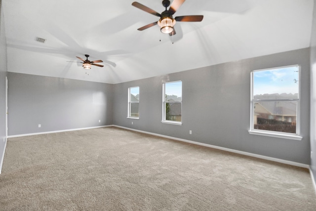 8207 Miramar Crest Ct, Tomball, TX 77375 - carpeted spare room featuring ceiling fan and lofted ceiling