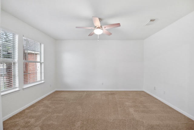 8207 Miramar Crest Ct, Tomball, TX 77375 - unfurnished room featuring a ceiling fan and light colored carpet