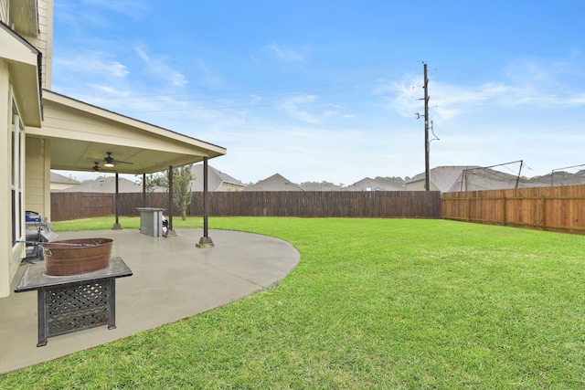 8207 Miramar Crest Ct, Tomball, TX 77375 - fenced backyard with a patio area and ceiling fan