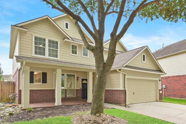 8207 Miramar Crest Ct, Tomball, TX 77375 - traditional-style house with brick siding, covered porch, roof with shingles, and concrete driveway